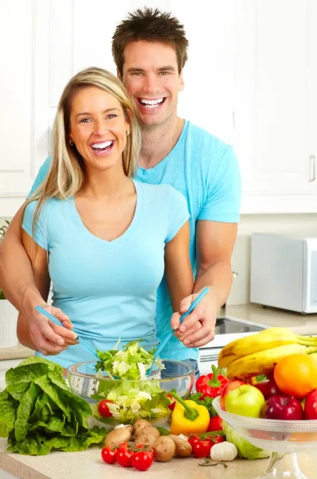 Illustration for a blog post about the proper diet for future parents – a couple preparing healthy food together.